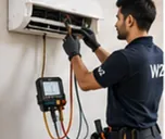 W2 technician diagnosing an appliance at a customer's home